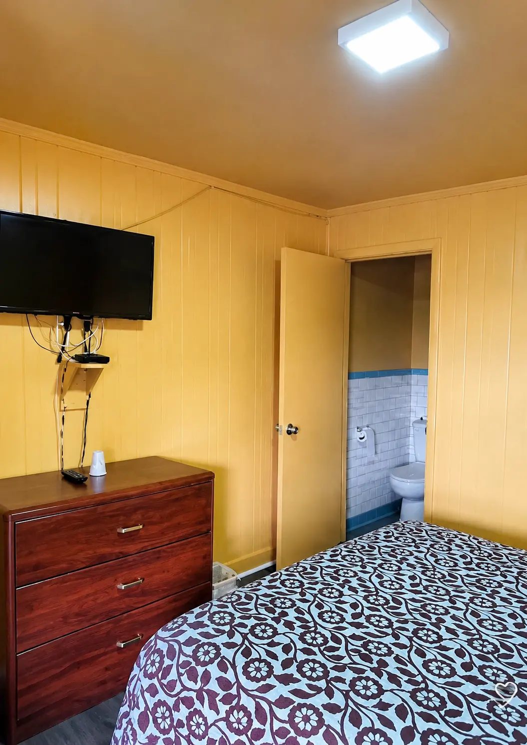 Room with bed and TV